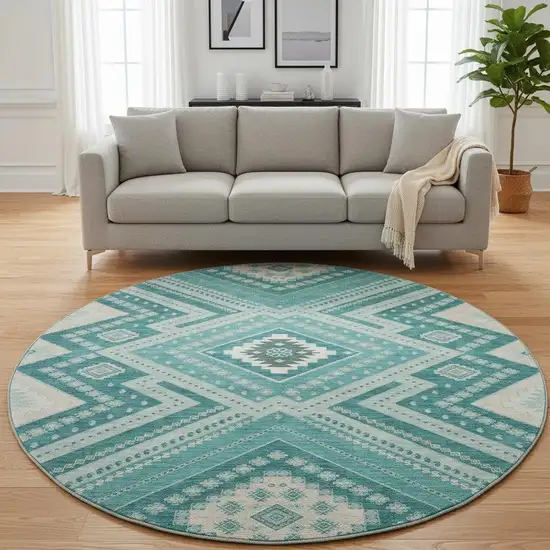 8' Teal Beige And Aqua Tribal Washable Round Rug With UV Protection Photo 2