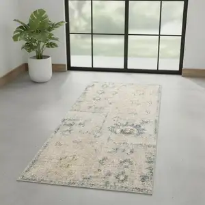 Photo of 6' Teal Beige And Brown Floral Distressed Runner Rug