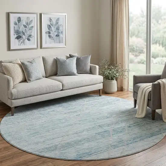 8' Teal Beige And Ivory Abstract Geometric Washable Round Rug With UV Protection Photo 1