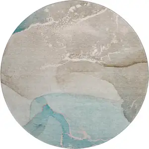 Photo of 8' Teal Beige And Ivory Abstract Washable Round Rug With UV Protection