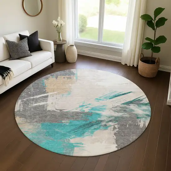8' Teal Beige And Ivory Abstract Washable Round Rug With UV Protection Photo 4