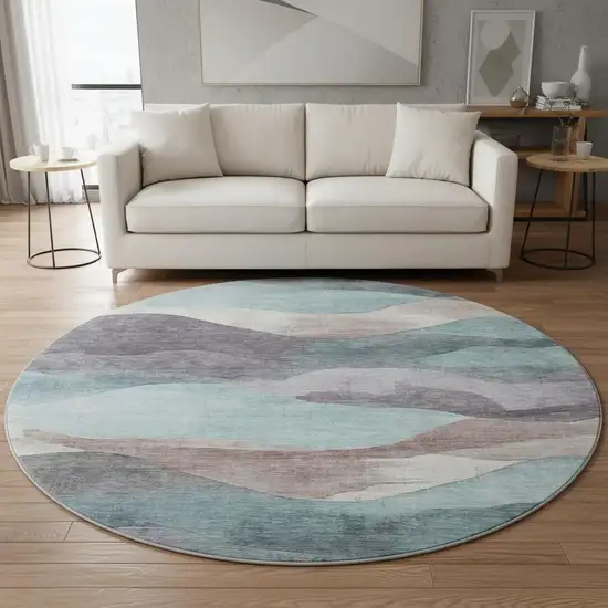 8' Teal Beige And Ivory Abstract Washable Round Rug With UV Protection Photo 2