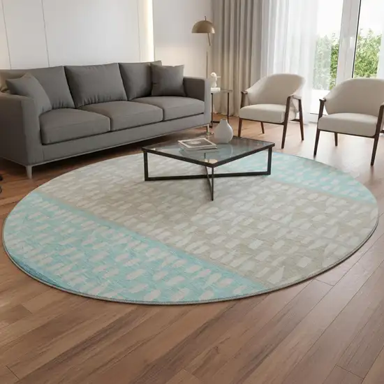 8' Teal Beige And Ivory Geometric Washable Round Rug With UV Protection Photo 2