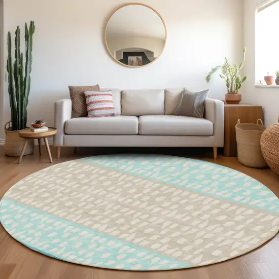 8' Teal Beige And Ivory Geometric Washable Round Rug With UV Protection Photo 3