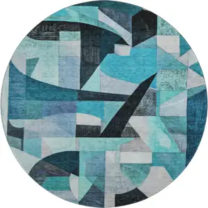 Photo of 8' Teal Black And Blue Abstract Washable Round Rug With UV Protection