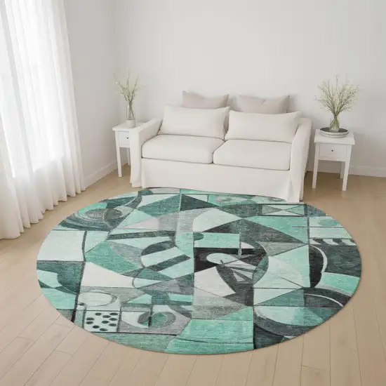 8' Teal Black And Ivory Abstract Washable Round Rug With UV Protection Photo 4