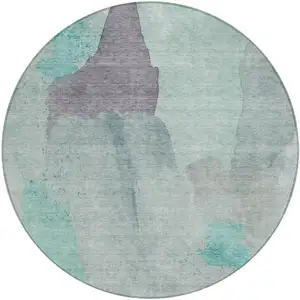 Photo of 8' Teal Blue And Aqua Round Abstract Washable Indoor Outdoor Area Rug