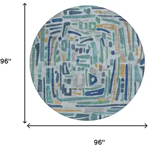 Photo of 8' Teal Blue And Aqua Round Abstract Washable Indoor Outdoor Area Rug