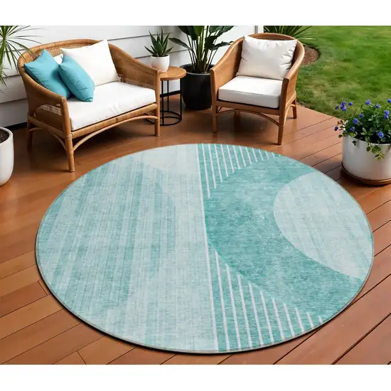 8' Teal Blue And Aqua Round Geometric Washable Indoor Outdoor Area Rug Photo 1