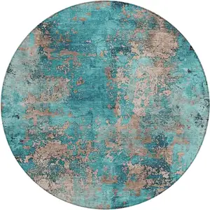 Photo of 8' Teal Blue And Beige Round Abstract Washable Indoor Outdoor Area Rug