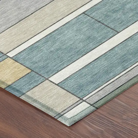 8' Teal Blue And Beige Round Geometric Washable Indoor Outdoor Area Rug Photo 3