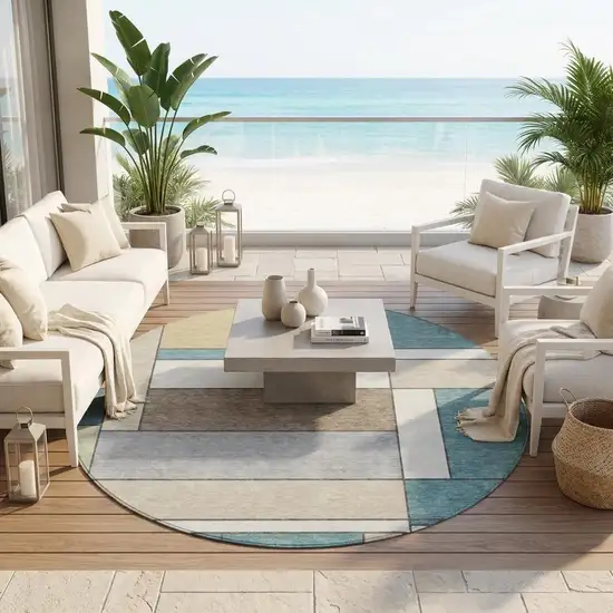 8' Teal Blue And Beige Round Geometric Washable Indoor Outdoor Area Rug Photo 1