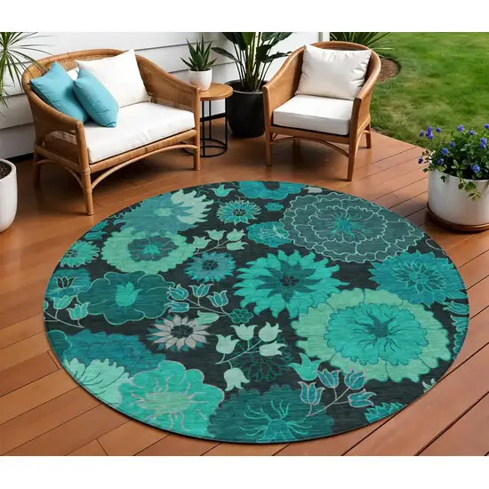 8' Teal Blue And Black Round Floral Washable Indoor Outdoor Area Rug Photo 1
