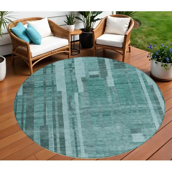 8' Teal Blue And Black Round Striped Washable Indoor Outdoor Area Rug Photo 1