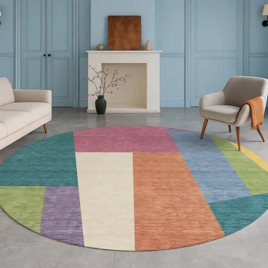 8' Teal Blue And Blush Round Geometric Washable Indoor Outdoor Area Rug Photo 5