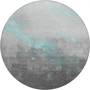 Photo of 8' Teal Blue And Charcoal Round Abstract Washable Indoor Outdoor Area Rug