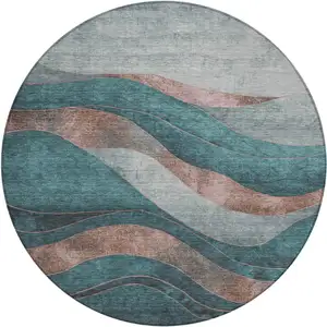 Photo of 8' Teal Blue And Copper Round Abstract Washable Indoor Outdoor Area Rug
