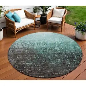 Photo of 8' Teal Blue And Dark Gray Round Ombre Washable Indoor Outdoor Area Rug