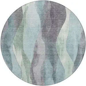 Photo of 8' Teal Blue And Fern Green Round Abstract Washable Indoor Outdoor Area Rug