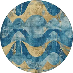 Photo of 8' Teal Blue And Gold Round Abstract Washable Indoor Outdoor Area Rug