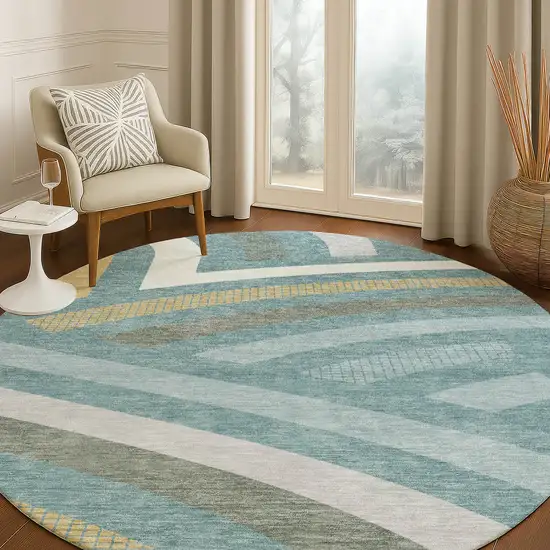 8' Teal Blue And Gold Round Abstract Washable Indoor Outdoor Area Rug Photo 5