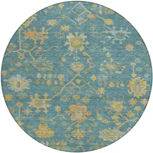 Photo of 8' Teal Blue And Gold Round Floral Washable Indoor Outdoor Area Rug