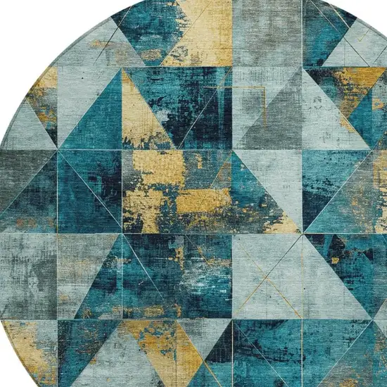 8' Teal Blue And Gold Round Geometric Washable Indoor Outdoor Area Rug Photo 4