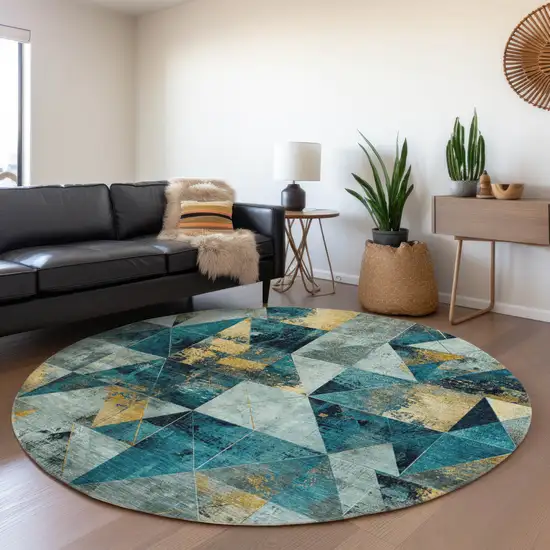 8' Teal Blue And Gold Round Geometric Washable Indoor Outdoor Area Rug Photo 6