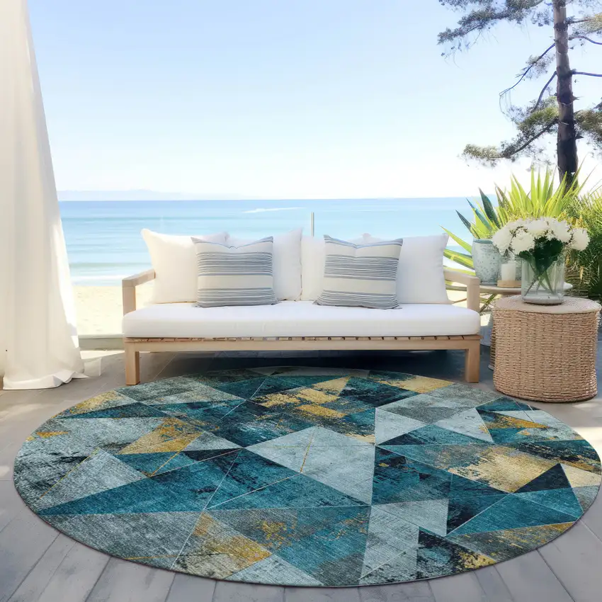 8' Teal Blue And Gold Round Geometric Washable Indoor Outdoor Area Rug Photo 5