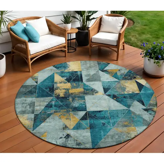 8' Teal Blue And Gold Round Geometric Washable Indoor Outdoor Area Rug Photo 2