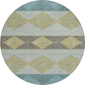 Photo of 8' Teal Blue And Gold Round Geometric Washable Indoor Outdoor Area Rug