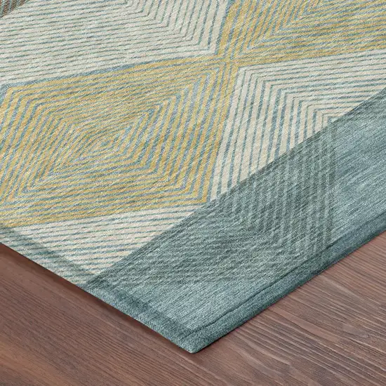 8' Teal Blue And Gold Round Geometric Washable Indoor Outdoor Area Rug Photo 6