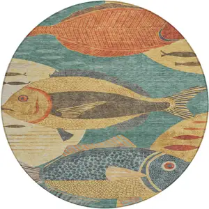 Photo of 8' Teal Blue And Gold Round Tropical Fish Washable Indoor Outdoor Area Rug