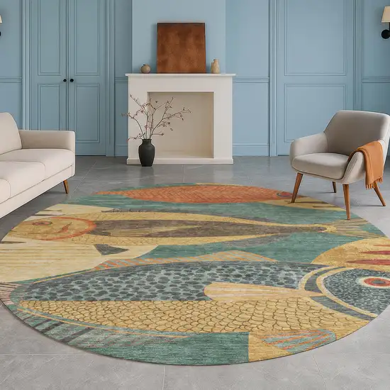 8' Teal Blue And Gold Round Tropical Fish Washable Indoor Outdoor Area Rug Photo 5