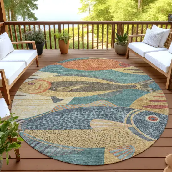 8' Teal Blue And Gold Round Tropical Fish Washable Indoor Outdoor Area Rug Photo 4