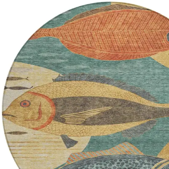 8' Teal Blue And Gold Round Tropical Fish Washable Indoor Outdoor Area Rug Photo 2