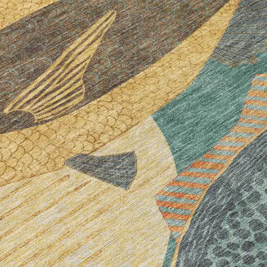 8' Teal Blue And Gold Round Tropical Fish Washable Indoor Outdoor Area Rug Photo 7