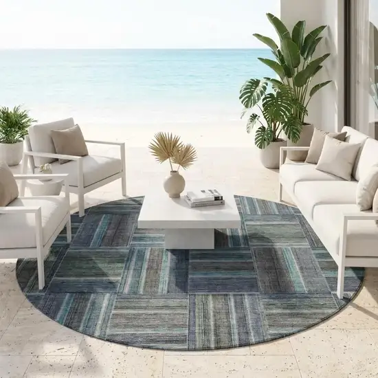 8' Teal Blue And Graphite Round Geometric Washable Indoor Outdoor Area Rug Photo 1