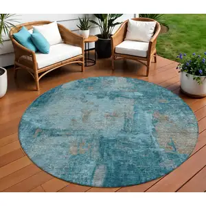 Photo of 8' Teal Blue And Gray Round Abstract Washable Indoor Outdoor Area Rug