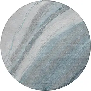 Photo of 8' Teal Blue And Gray Round Abstract Washable Indoor Outdoor Area Rug