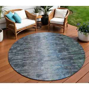 Photo of 8' Teal Blue And Gray Round Abstract Washable Indoor Outdoor Area Rug