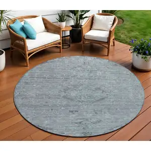 Photo of 8' Teal Blue And Gray Round Floral Washable Indoor Outdoor Area Rug