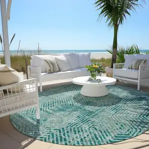 Photo of 8' Teal Blue And Gray Round Geometric Washable Indoor Outdoor Area Rug