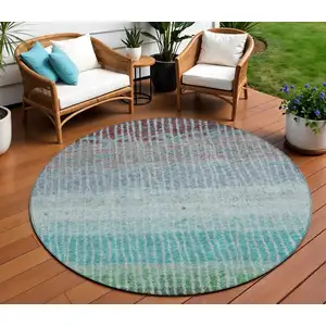 Photo of 8' Teal Blue And Green Round Striped Washable Indoor Outdoor Area Rug