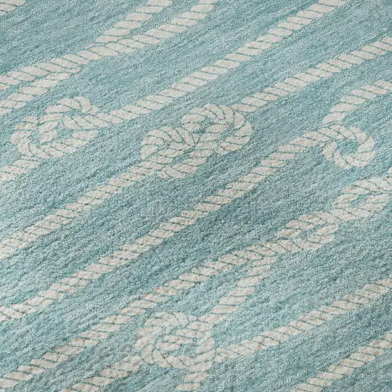 8' Teal Blue And Ivory Nautical Washable Round Rug With UV Protection Photo 9