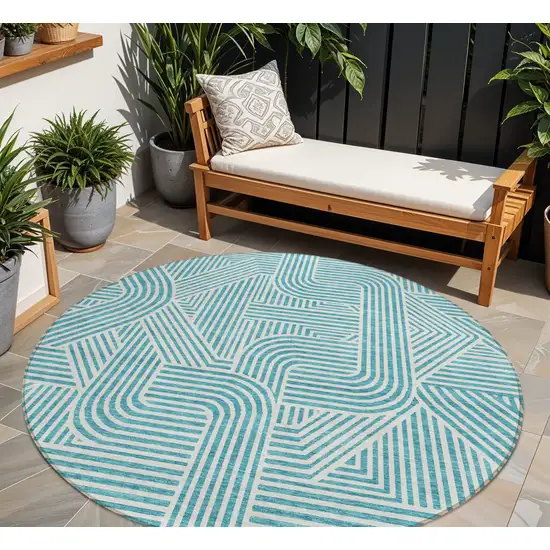 8' Teal Blue And Ivory Round Abstract Washable Indoor Outdoor Area Rug Photo 1