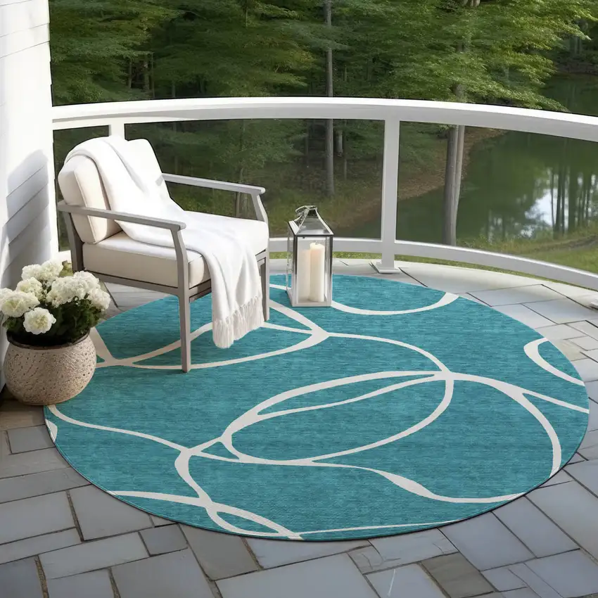8' Teal Blue And Ivory Round Abstract Washable Indoor Outdoor Area Rug Photo 7