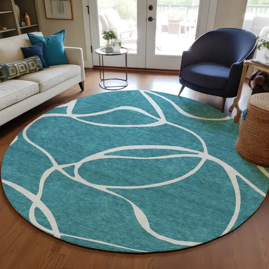 8' Teal Blue And Ivory Round Abstract Washable Indoor Outdoor Area Rug Photo 8