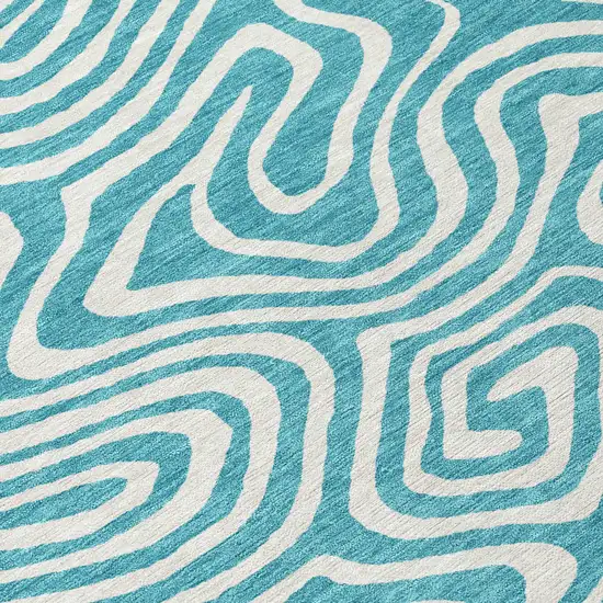 8' Teal Blue And Ivory Round Abstract Washable Indoor Outdoor Area Rug Photo 8