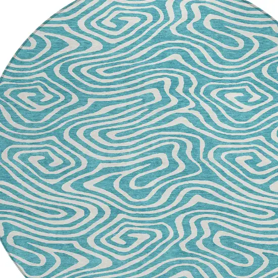 8' Teal Blue And Ivory Round Abstract Washable Indoor Outdoor Area Rug Photo 4